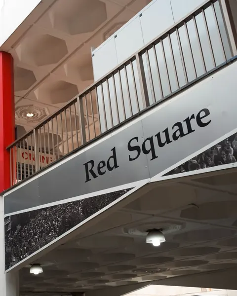 The Red Square sign inside the Plaza, above historic photographs